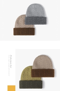 Detailed knit texture of cuffed fisherman beanies in various earth tone colors