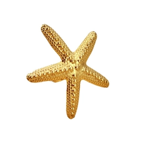 Elegant gold starfish ring with granular texture and polished finish on white background