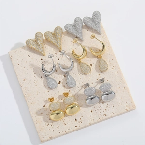 Elegant gold and silver heart teardrop earring set with micro-pave cubic zirconia