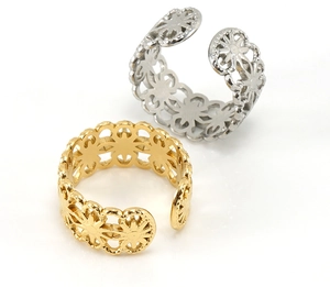 Detail of hollow sunflower carved adjustable rings in polished gold and silver finish