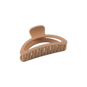 Elegant matte milk tea hair claw clip in a half-moon hollow design on white background