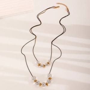 Collar de doble capa con cadena de serpiente negra, cuentas de cristal y detalles dorados