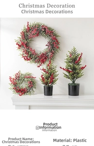 Close-up of Nordic style red berry Christmas wreaths and mini trees on white mantel