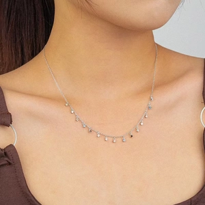 Close-up of S925 silver necklace featuring colorful micro-set zircon fringe tassels