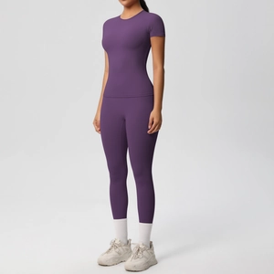 Detail view of purple double-sided brushed yoga set showing high-waist fit and fabric texture