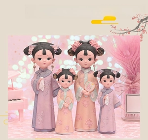 Detailed close-up of four resin Chinese palace dolls with floral embroidery and fans