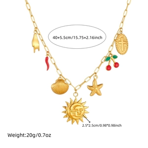 Gold plated stainless steel necklace featuring vintage sea shells and sun face charms
