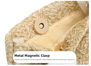 Detailed view of straw woven bag featuring a golden magnetic clasp and textured lining