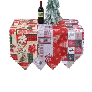 Christmas table runner with festive floral print and Merry Christmas text decor