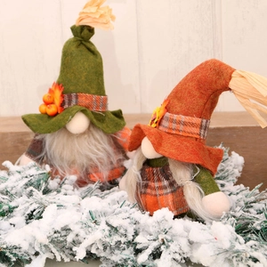 Autumn gnome plush set with fall leaves and festive harvest theme decorations