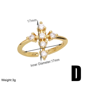 Detailed macro view showing the 17mm inner diameter of a gold bear cross ring