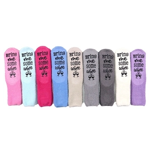 Set of 9 colorful coral fleece non-slip sleep socks with wine text on white background