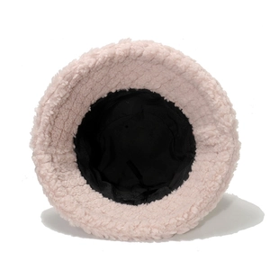 Pink plush faux shearling bucket hat for women with warm black fabric lining for winter