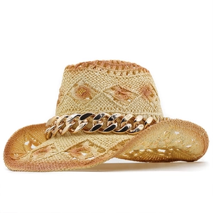 Straw cowboy hat with hollow geometric patterns and gold chain accent for sun protection