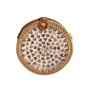 Handmade shell-inlaid crossbody bag with heart-shaped mother of pearl and rattan weave