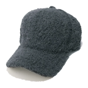 Close-up of dark grey plush baseball cap showing heavy wool-like curly fleece texture