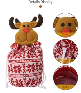 Detail view of reindeer knitted gift bag showing drawstring rope and inside structure
