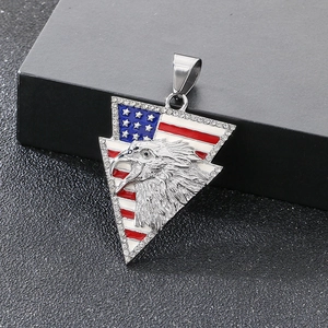 Detail of triangular eagle pendant with US flag stars, stripes and inlaid rhinestones
