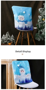 Detail view of blue Christmas chair covers featuring snowman and Santa Claus patterns
