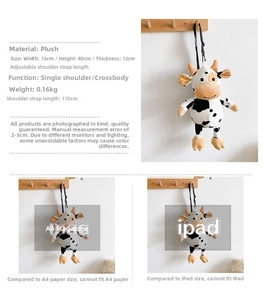 Size comparison of plush cow crossbody bag with A4 magazine and iPad for scale