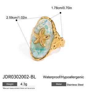 Detailed view of starfish ring dimensions with blue shell inlay and gold-tone finish