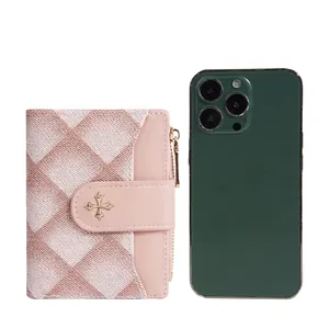 Pink quilted fabric and leather compact wallet for women with golden cross buckle