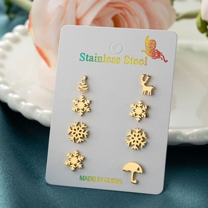 Christmas stud earrings set with snowflake, reindeer, and tree in gold stainless steel