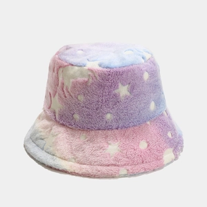 Close-up of soft pink and purple gradient plush fabric with white star print details