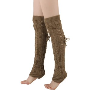 Detail of dark khaki cable knit leg warmer with decorative side ribbon lace-up bow