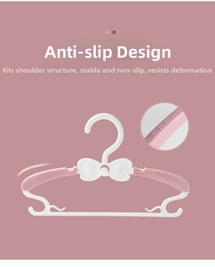 Close-up of non-slip rubber strips on telescopic children's hangers for shoulder protection