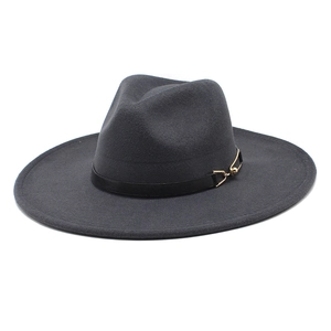 Detailed view of dark grey wool fedora featuring a black leather band and gold horseshoe buckle