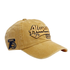 Detail of vintage washed mustard yellow baseball cap with Always 75 letter embroidery