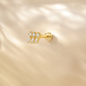 Detailed view of gold 925 sterling silver earring with clear zircon and 925 stamp
