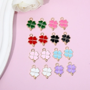 Detailed set of sixteen four-leaf clover charms in eight vibrant enamel colors for DIY jewelry