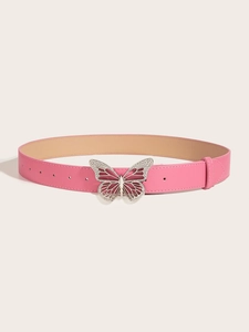 Detail of pink PU leather belt featuring a metal butterfly buckle with sparkling crystals