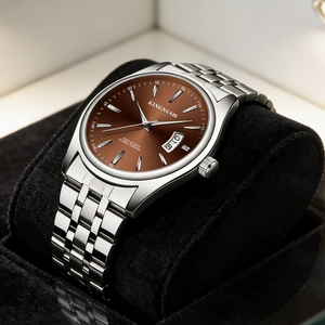 Elegant Kingnuos waterproof quartz watch with brown dial and silver steel band on velvet pillow