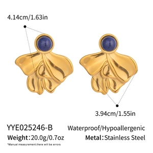 Detail view of retro geometric gold earrings with lapis stone and precise dimensions