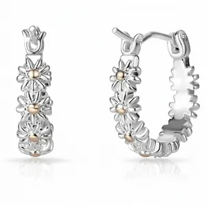 Exquisite two-tone daisy flower hoop earrings in silver metal with yellow accents