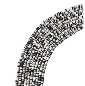 Detalle de cuentas de arcilla polimérica de 4mm negro, blanco y gris para joyería artesanal
