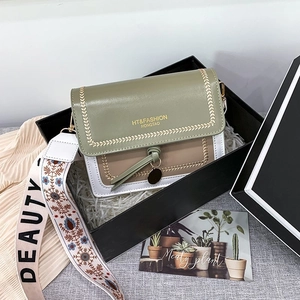 Green and beige contrast crossbody bag in gift box with stylish patterned wide strap