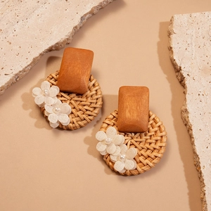 Bohemian rattan hoop earrings with wood accent and white fabric flowers decoration
