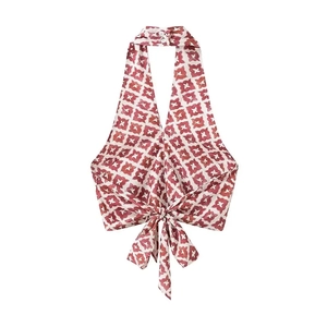 Detailed view of red and white floral halter neck crop top with back tie fastening