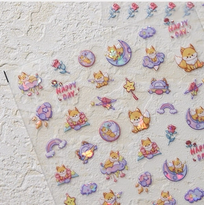 Detail of 3D embossed nail stickers featuring cute fox moon and laser gold finish