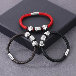 Detailed view of woven leather bracelets in red, brown, and black with silver magnetic clasps