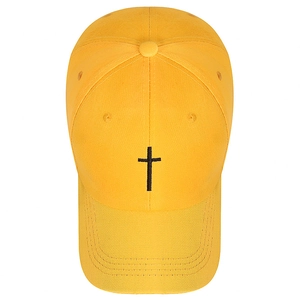 Bright yellow cotton baseball cap with black embroidered cross and classic curved brim