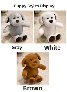 Trois chiens en peluche gris, blancs et marrons en position assise les uns à côté des autres