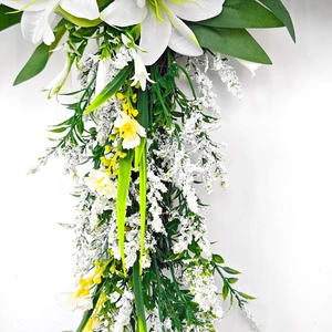 Easter Lily Cross Door Swag with white lilies and yellow flowers on white background