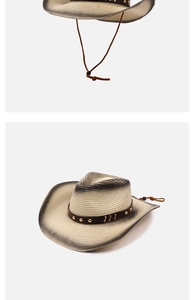 Detail of vintage straw cowboy hat with gradient brim and metallic studded leather band