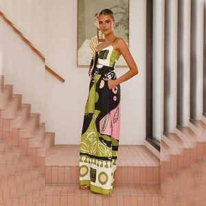 Detail of colorful abstract geometric print jumpsuit with side pockets and tied chest