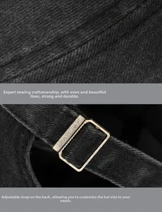 Detail of adjustable metal buckle and stitching on vintage black baseball cap